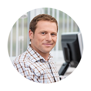 Knick customer service, showing a friendly person. The person is in the office. 